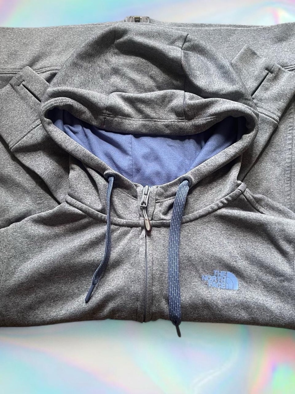 The North Face Grey Hoodie with Blue Lining and Drawstrings